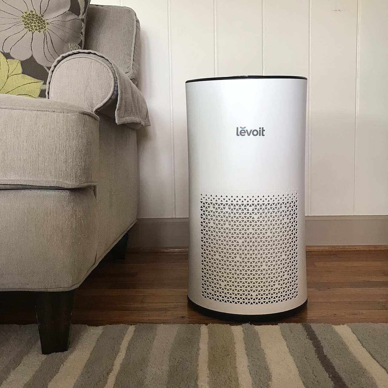 A Levoit air purifier in a living room